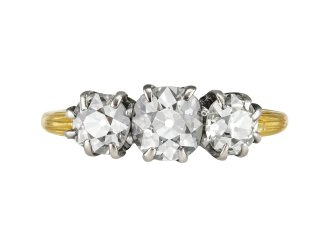 Old mine diamond three stone ring, early 20th Century.