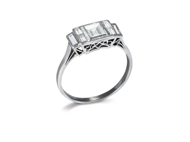 Art Deco diamond flanked solitaire ring, circa 1930.