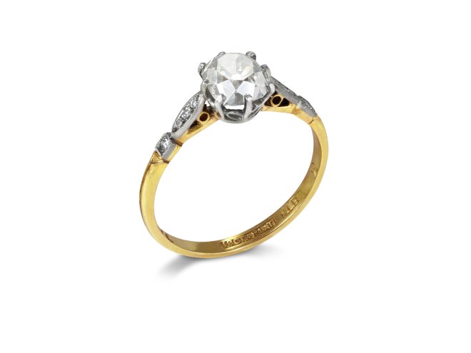 Old mine diamond flanked solitaire ring, early 20th Century.
