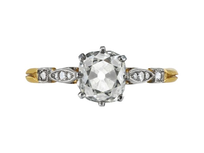 Old mine diamond flanked solitaire ring, early 20th Century.