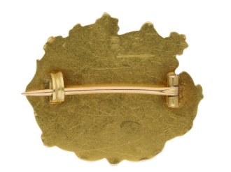 Signed Art Nouveau gold brooch set with rose cut diamonds, circa 1900.