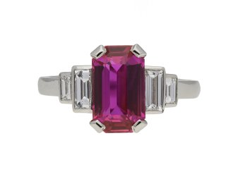 Ruby and diamond flanked solitaire ring berganza hatton garden