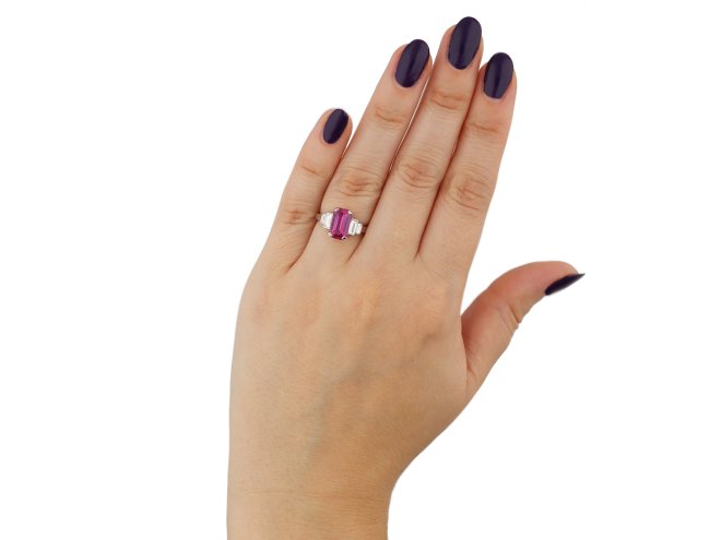 Ruby and diamond flanked solitaire ring berganza hatton garden