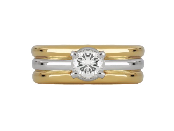 Contemporary solitaire diamond ring in 18ct yellow gold.