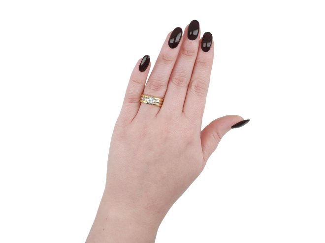 Contemporary solitaire diamond ring in 18ct yellow gold.