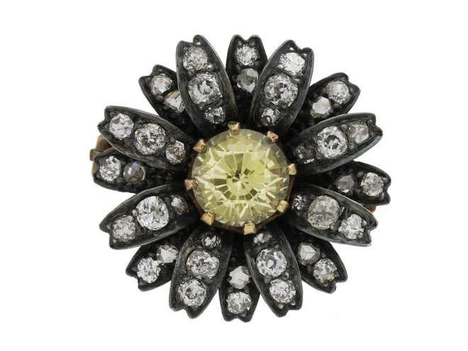Victorian yellow sapphire and diamond flower brooch, circa 1880.