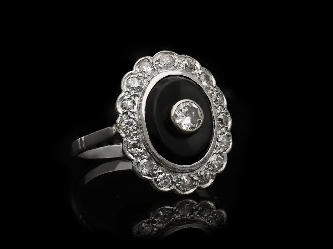 Art Deco onyx and diamond coronet cluster ring, circa 1920. Hatton Garden