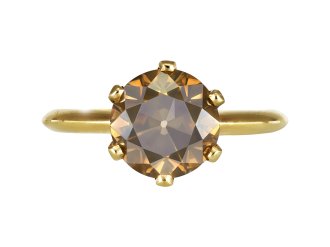 Fancy deep yellowish brown diamond ring.