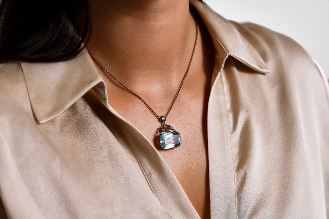 Aquamarine and diamond pendant, English, circa 1910.