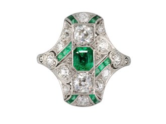 Edwardian emerald and diamond cluster ring, circa 1910.