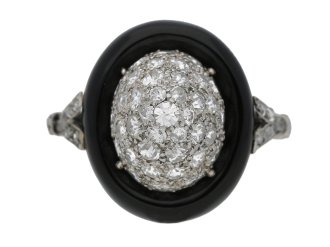 Art Deco diamond and onyx cluster ring, circa 1925.