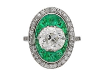Old mine diamond and emerald cluster ring, circa 1920.