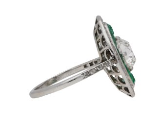 Old mine diamond and emerald cluster ring, circa 1920.
