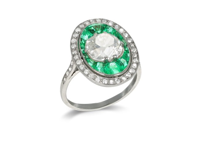 Old mine diamond and emerald cluster ring, circa 1920.