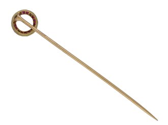 Cartier ruby and diamond winning post pin, French, circa 1910. 