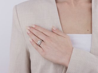 Round and baguette diamond cluster ring, American, circa 1950.