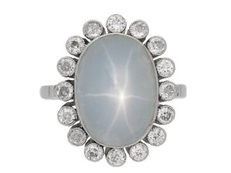 Star sapphire and diamond coronet cluster ring, circa 1920.   