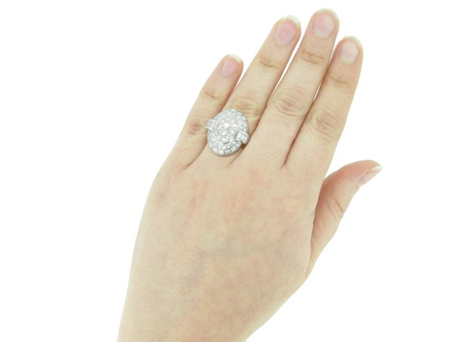hand view Vintage oval diamond cluster ring berganza hatton garden